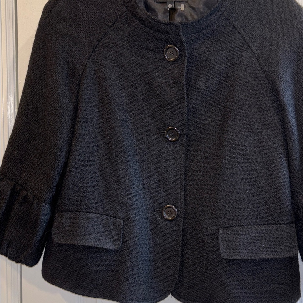 Talbots Black Ruffled Sleeve Jacket
Size 8P 3 BUTTON CLOSURE TEXTURED MATERIAL